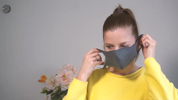 Woman Wearing Protective Mask on Her Face at Home