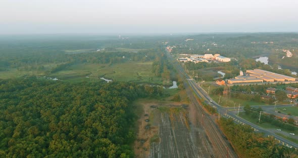 Industrial Landscape with Railroad in Railway Cargo Railroad Platform at Sunset