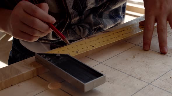 Teenager Drafting in Carpentry Shop