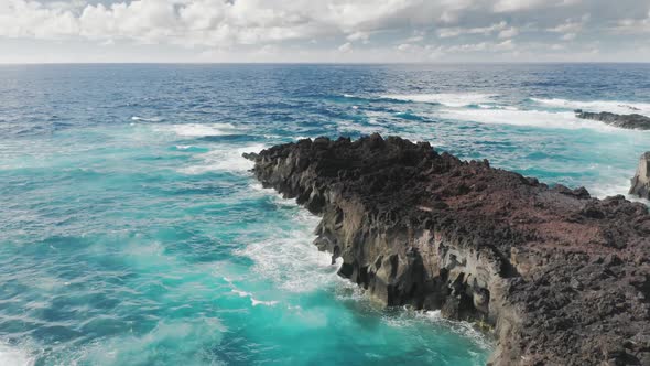 Beautiful Fossil Formation Washed with Turquoise Ocean Waters