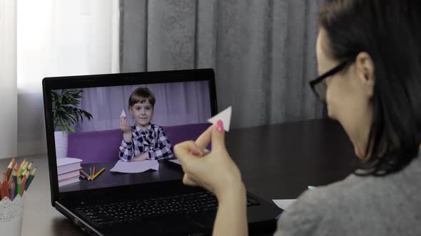 Teacher Making Video Call on Laptop with Pupil. Distance Children Education