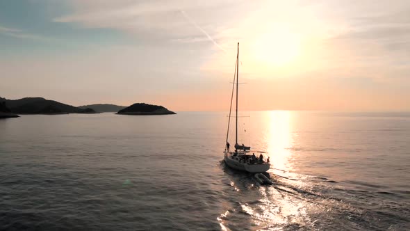 Sailboat with people floating on sea in Croatia