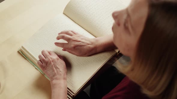 Blind Woman Reading Braille Book Top View Poorly Seeing Female Person Learning to Read Home