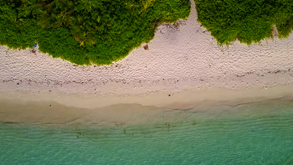 Warm seascape of marine lagoon beach trip by sea with sand background near palms