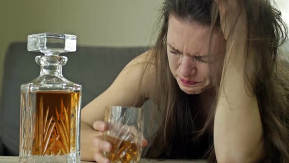 Crying Woman Drinking Alcohol Alone