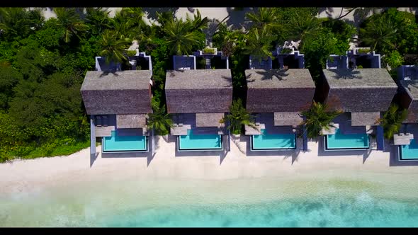 Aerial view sky of perfect lagoon beach time by blue green water and white sandy background of a day