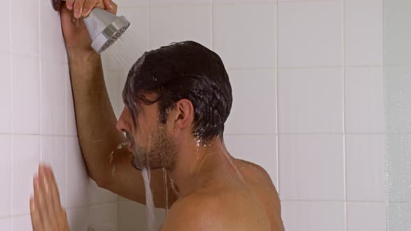 Athletic Man Showering