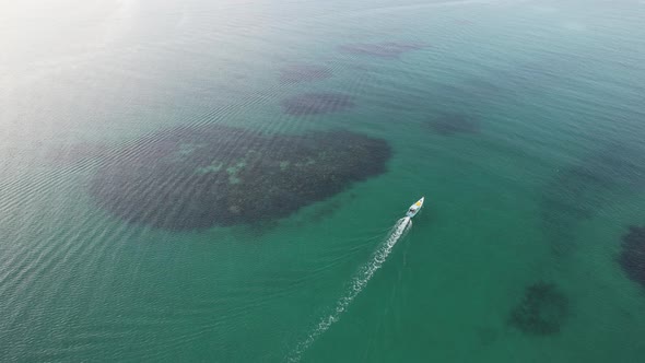 Aerial Boat on tropical Beach