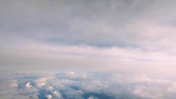 Looking at the clouds and Da Nang city in the airplane in Asia.