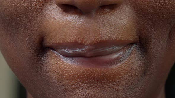 Macro Shot of Female Person Moving Her Lips on Camera