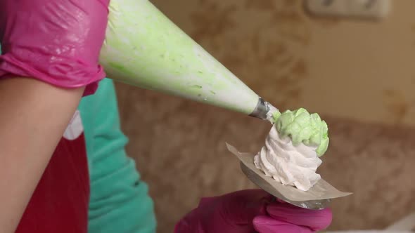 A Woman Makes Cones From Marshmallows.