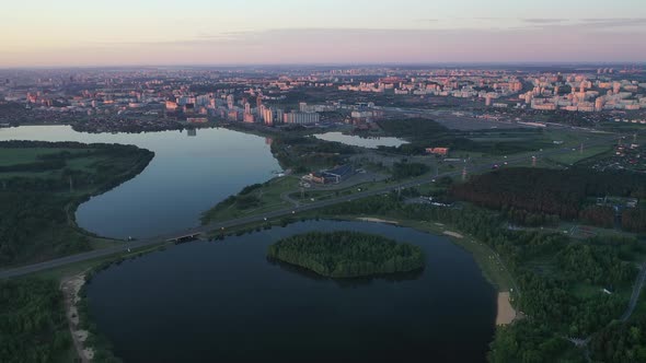 Top View of the Drozdov Reservoir and the Ring Road in Minsk at Dawn