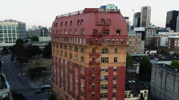 aerial drone footage of downtown Vancouver buildings, gastown, early sunrise, morning urban scrapers
