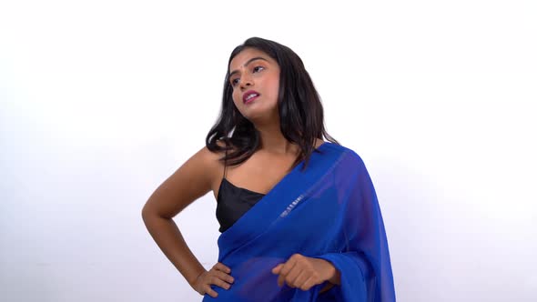 Indian woman waiting for someone in saree