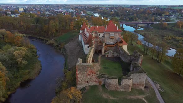 Bauska Medieval Castle Ruins Complex and Park From Above Aerial Shot 4K Video