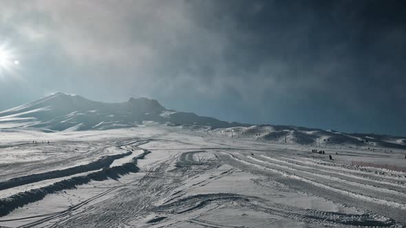 Time Lapse of Clouds Passing By Slope of Ski Resort