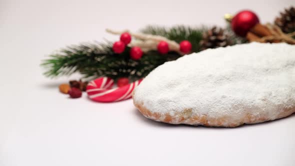 Traditional Christmas Stollen Cake with Marzipan and Dried with New Year Decorations