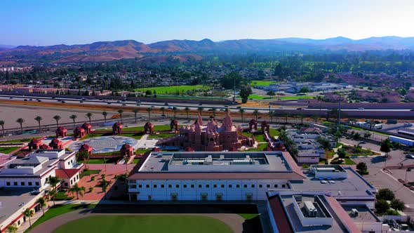 Drone view flying towards a Hindu temple near Los Angeles California