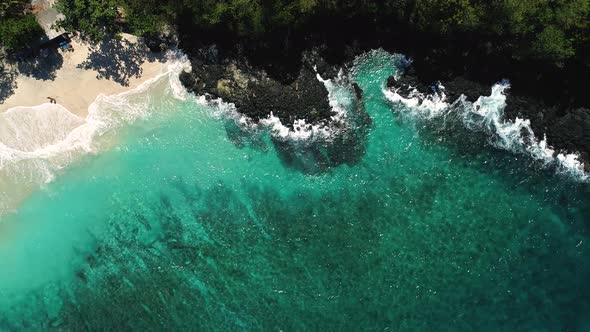 Ocean Waves Breaking On Shore near Beautiful Beach