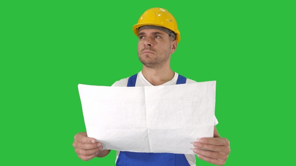 Engineer or Architect or Construction Worker holding blueprint