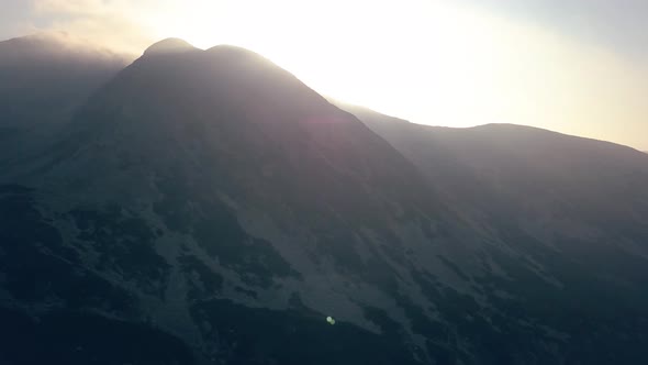 Wide shot of aerial drone view of Retezat Mountains, Romania