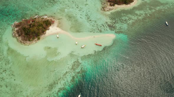 Small Torpic Island with a White Sandy Beach, Top View.