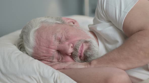 Close Up of Old Man Sleeping in Bed 