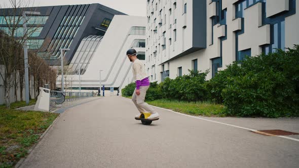 Young Skater Guy Riding Outside