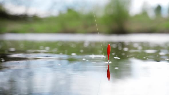 Fishing Rod Float in the Water