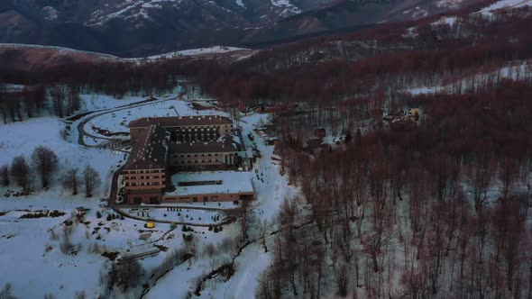 Aerial view at the mountain on a sunny winter day