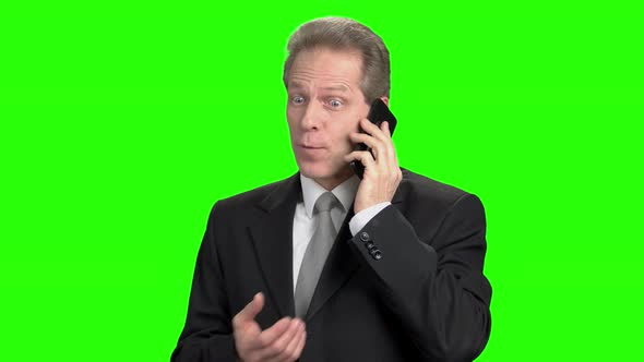 Excited Energized Mature Man Talking on Phone