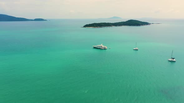 Luxury ship sailing tranquil sea. Aerial view of yacht racing sea bay