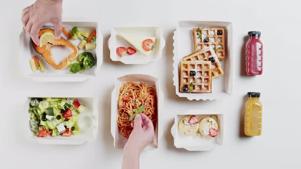 Food Delivery Top View Take Away Meals in Disposable Containers on White Background