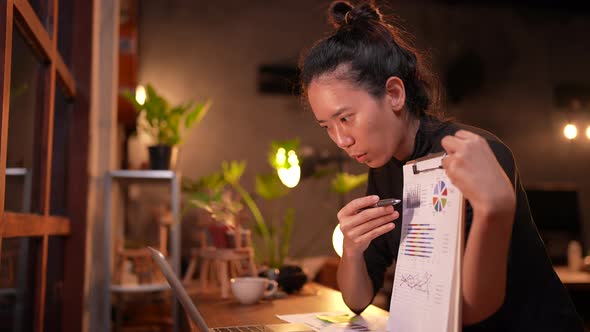 young business people working and approving document in cafes co-working space using computer laptop