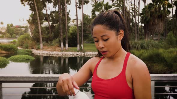 Woman working out in the park alt