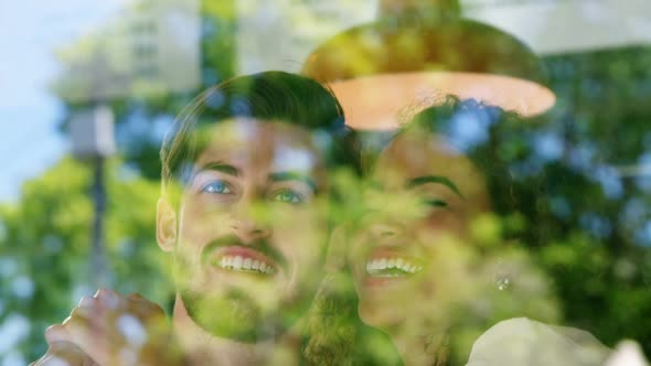 Couple embracing in restaurant