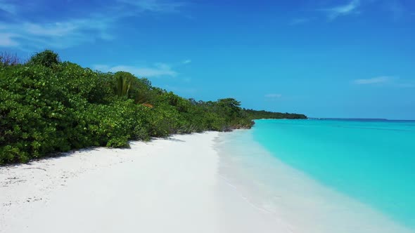 Aerial top down texture of exotic coastline beach journey by blue green ocean with white sand backgr