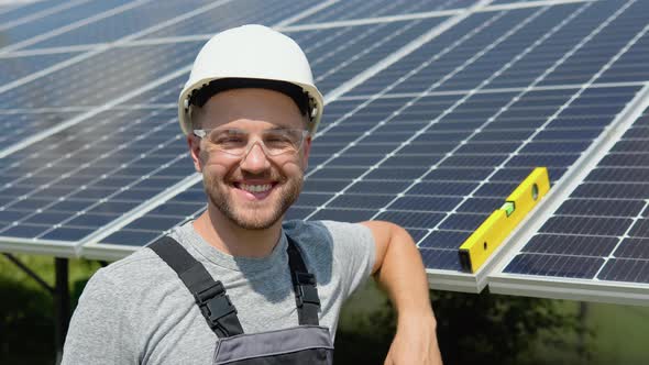 Portrait of Confident Engineer of Solar Cell Farm Industry