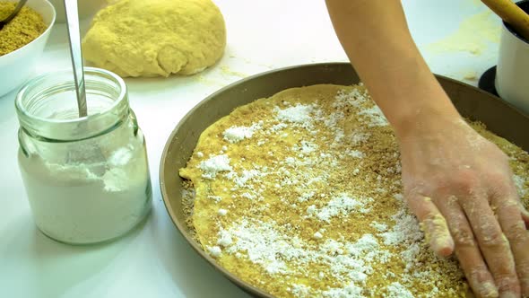 A Woman is Preparing Baklava in the Kitchen