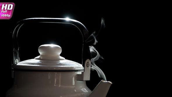 White Steam Flowing From A Teapot