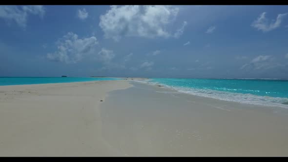 Aerial drone view travel of marine lagoon beach holiday by blue green sea with white sandy backgroun