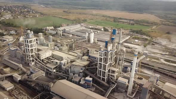 Aerial view of cement plant factory at industrial production area.