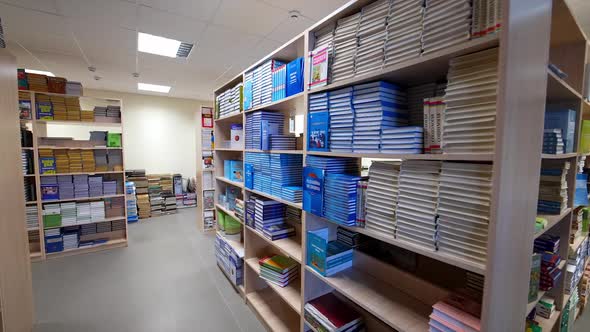 Bookshelves in library with old books. Large bookcase with lots of books at library