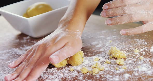 Woman preparing a dough ball 4k