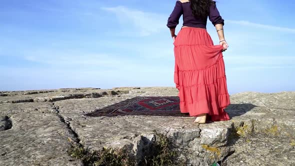 woman dancing on the rock