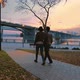 Two Lovers Are Walking Along the Embankment - VideoHive Item for Sale