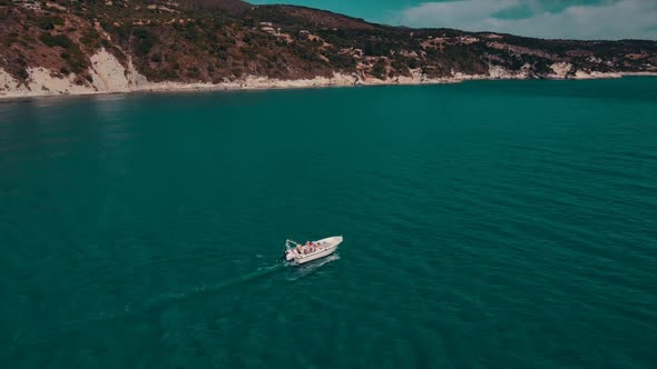 Following the boat in the sea