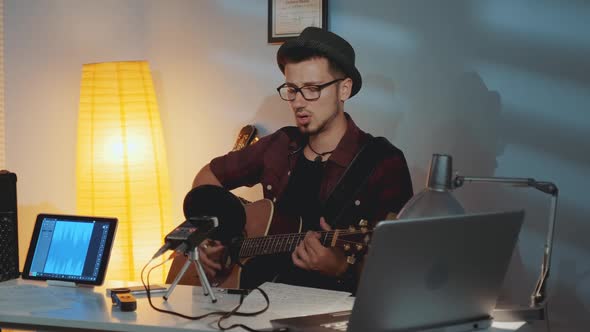 Guitarist Is Dissatisfied with His Friend Playing the Instrument and Showing His Mistake 