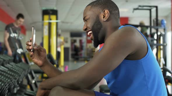 Smiling Afro-American Athlete Taking Selfie in the Gym, Modern Technologies
