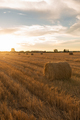 Sunset on the field with haystack - PhotoDune Item for Sale